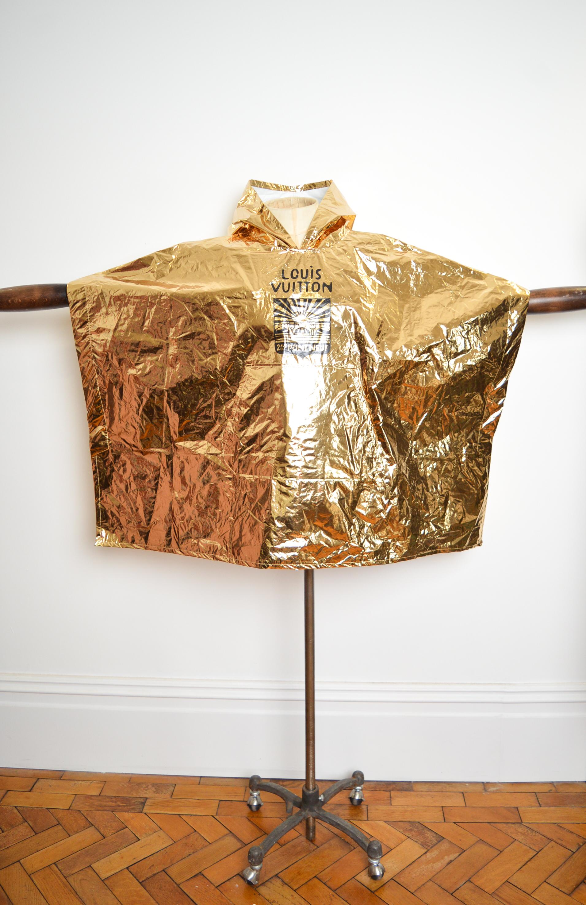 LOUIS VUITTON Spring Summer 2024 Show Invitation - Gold Souvenir Festival Poncho For Sale 3