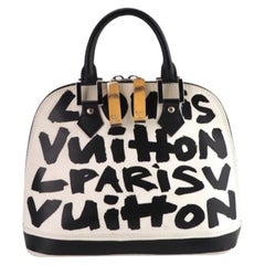 Louis Vuitton Stephen Sprouse Tan And Black Leopard Chenille And Leather  North-South Bag Silver Hardware, 2012 Available For Immediate Sale At  Sotheby's