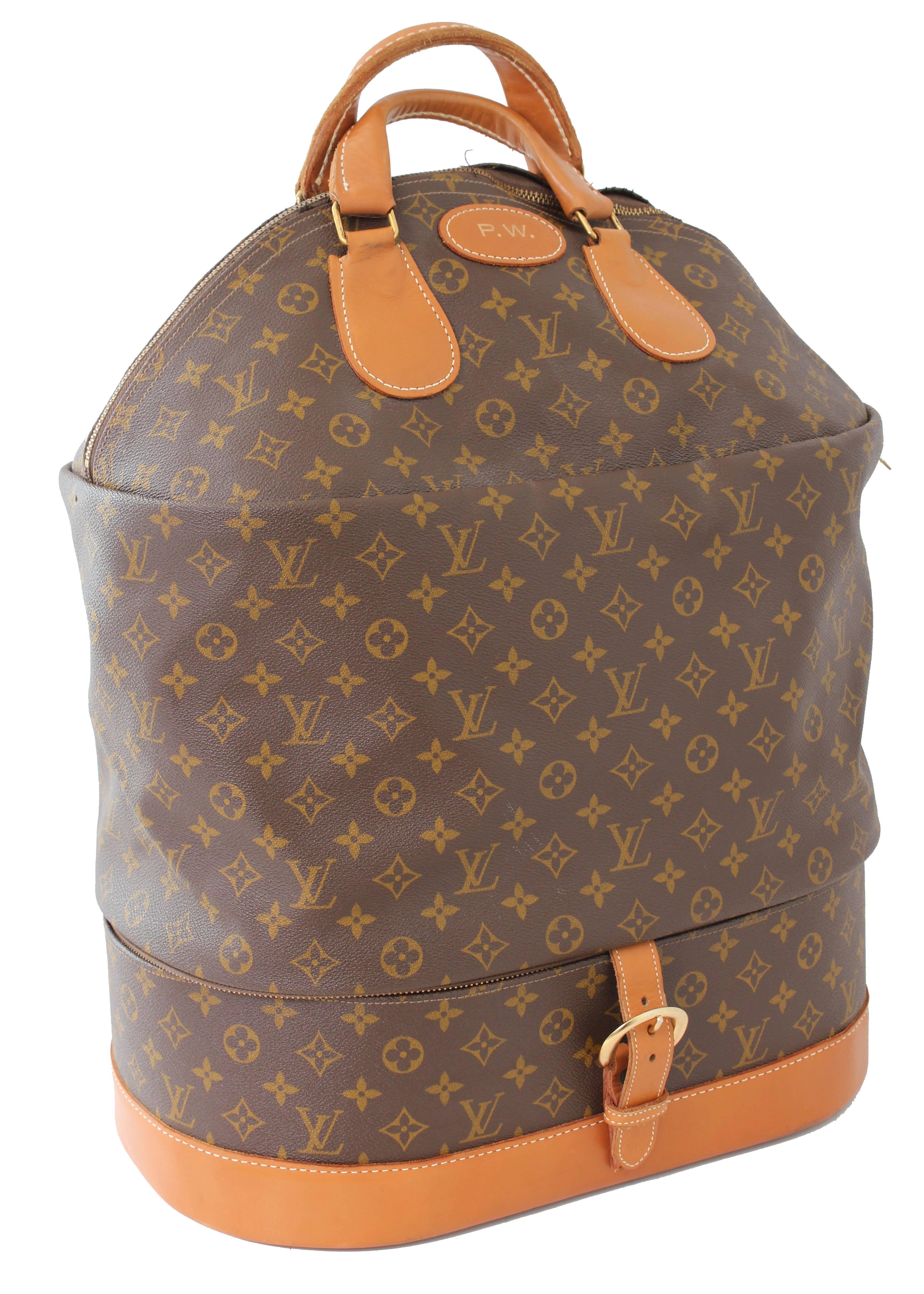 This large and very rare travel bag was originally sold by Neiman Marcus and made under special license by The French Company for Louis Vuitton, long before LV had a boutique presence in the USA. Produced for only a short period, these incredible
