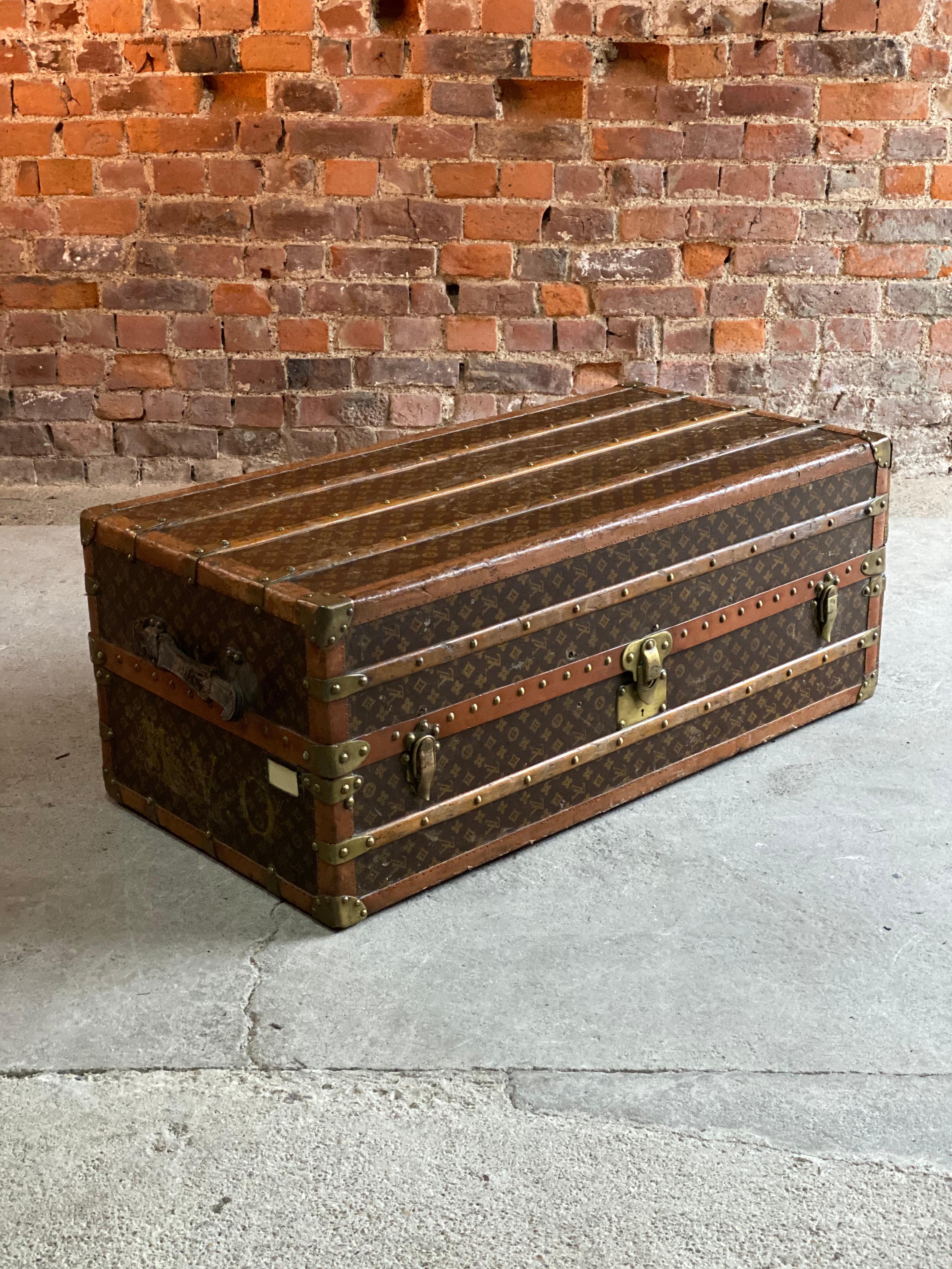 Louis Vuitton steamer trunk wardrobe trunk chest France circa 1920

Louis Vuitton wardrobe steamer trunk, early 20th century circa 1920, with brass and leather edges, with hanging space and four stamped hangers with a ratchetted rail, with five