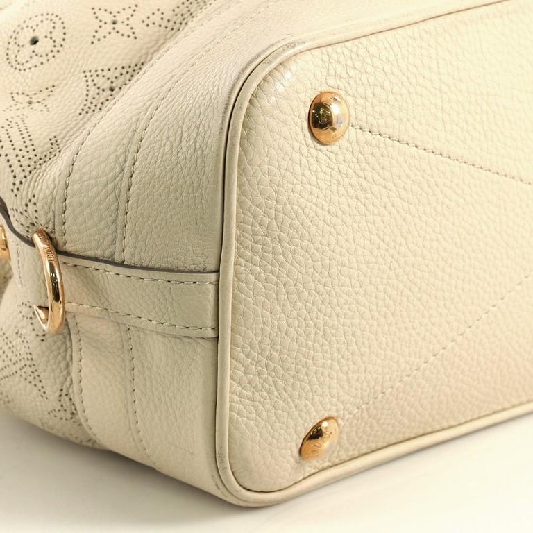 LOUIS VUITTON Ivory Perforated Mahina Leather Stellar PM at 1stDibs