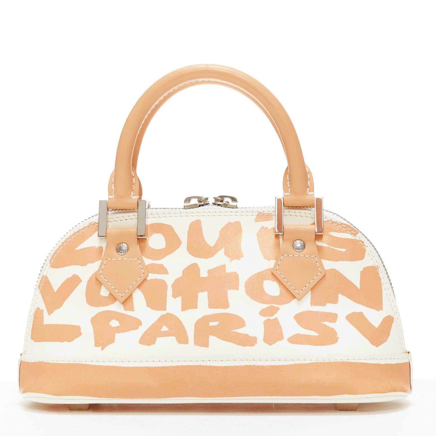 LOUIS VUITTON Stephen Spouse Alma Horizontal beige white graffiti leather bag For Sale 1