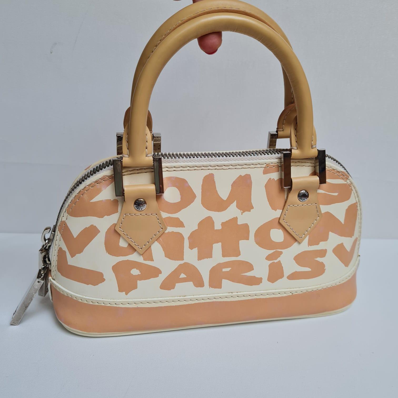 Louis Vuitton - Mini sac Graffiti « Stephen Sprouse » avec motif East West Pour femmes en vente