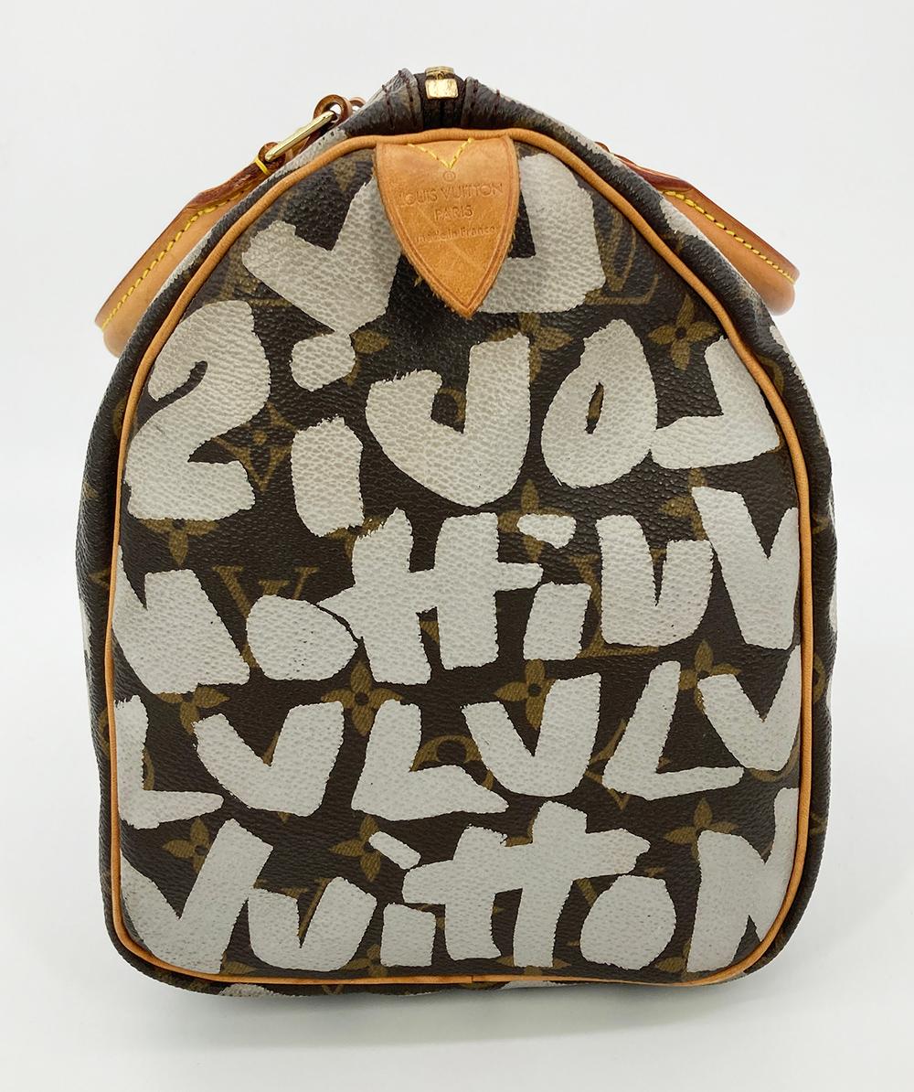 Louis Vuitton Stephen Sprouse Graffiti Monogram Speedy 30 in good condition. Signature monogram canvas with grey graffiti print, tan vachetta leather trim and brass hardware. Top zipper closure opens to an unlined canvas interior with one side slit