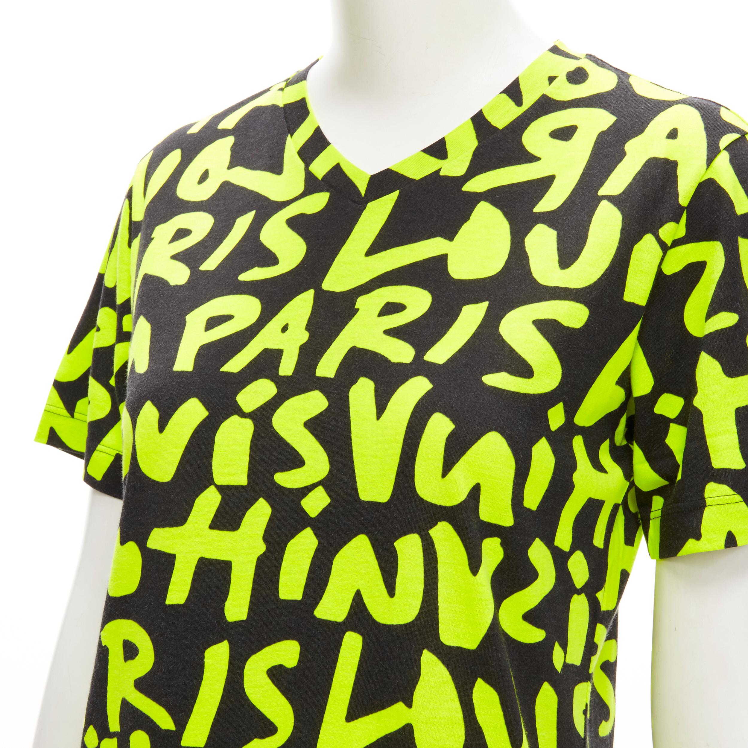 LOUIS VUITTON Stephen Sprouse Iconic Graffiti black neon yellow tshirt 
Reference: ANWU/A00638 
Brand: Louis Vuitton 
Designer: Marc Jacobs 
Collection: Stephen Sprouse Graffiti 
Material: Feels like cotton 
Color: Black 
Pattern: Graffiti 
Extra