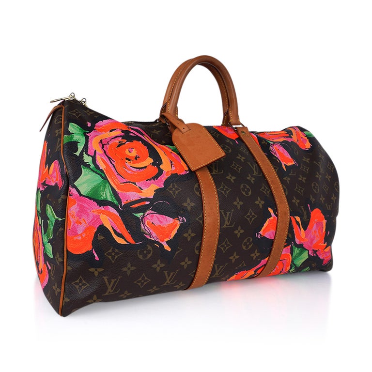 Mightychic offers a highly coveted and sought after Louis Vuitton X Stephen Sprouse Monogram Roses red Limited Edition iconic Keepall 50.
This highly coveted and sought after limited edition stunning travel tote is a timeless must have
for any