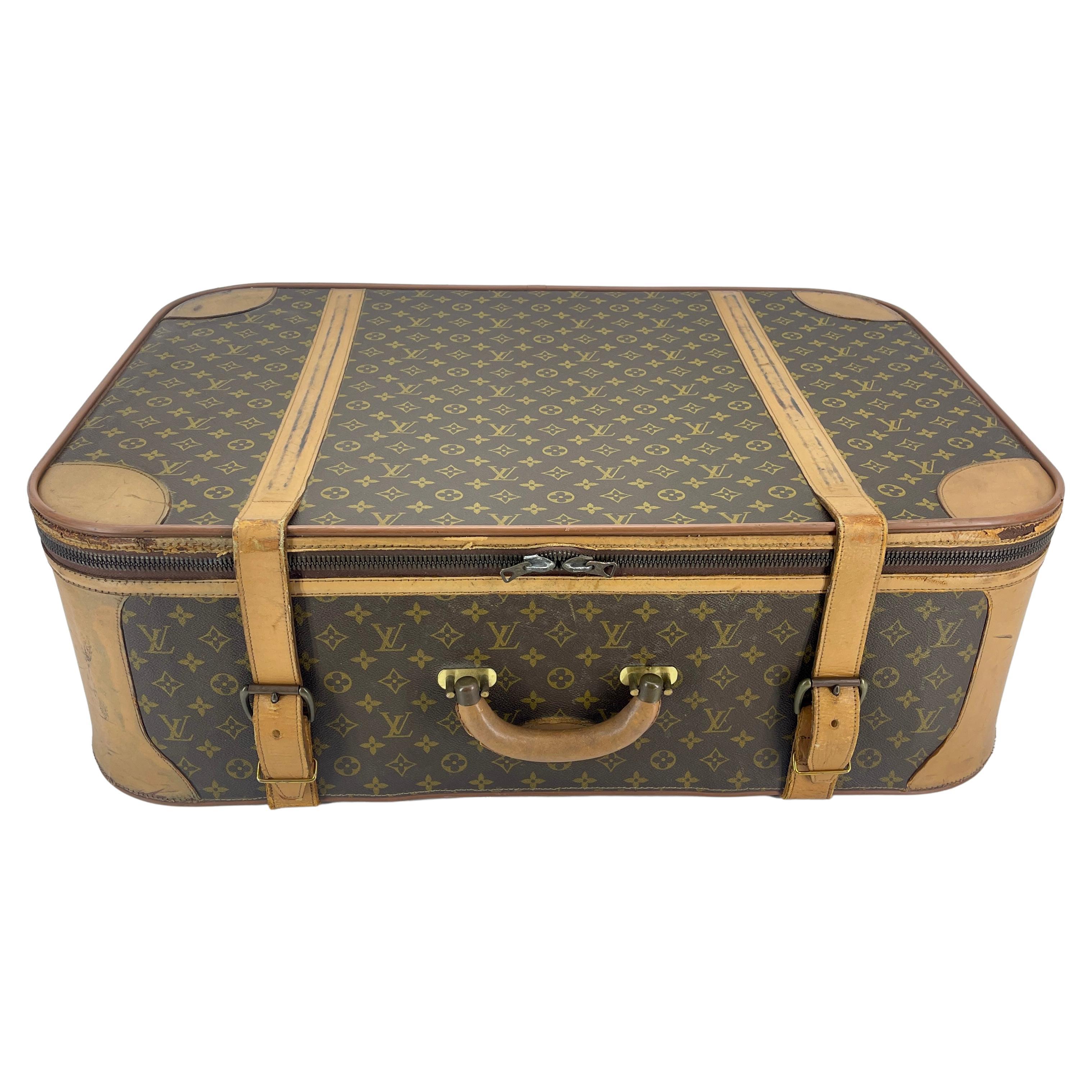 Vintage Monogram Trunk Travel Stratos Suitcase by Louis Vuitton

Crafted with the distinct Monogram brown coated canvas, the Stratos has cowhide leather side supports and bumpers with a yellow fabric interior.

Note this piece has been