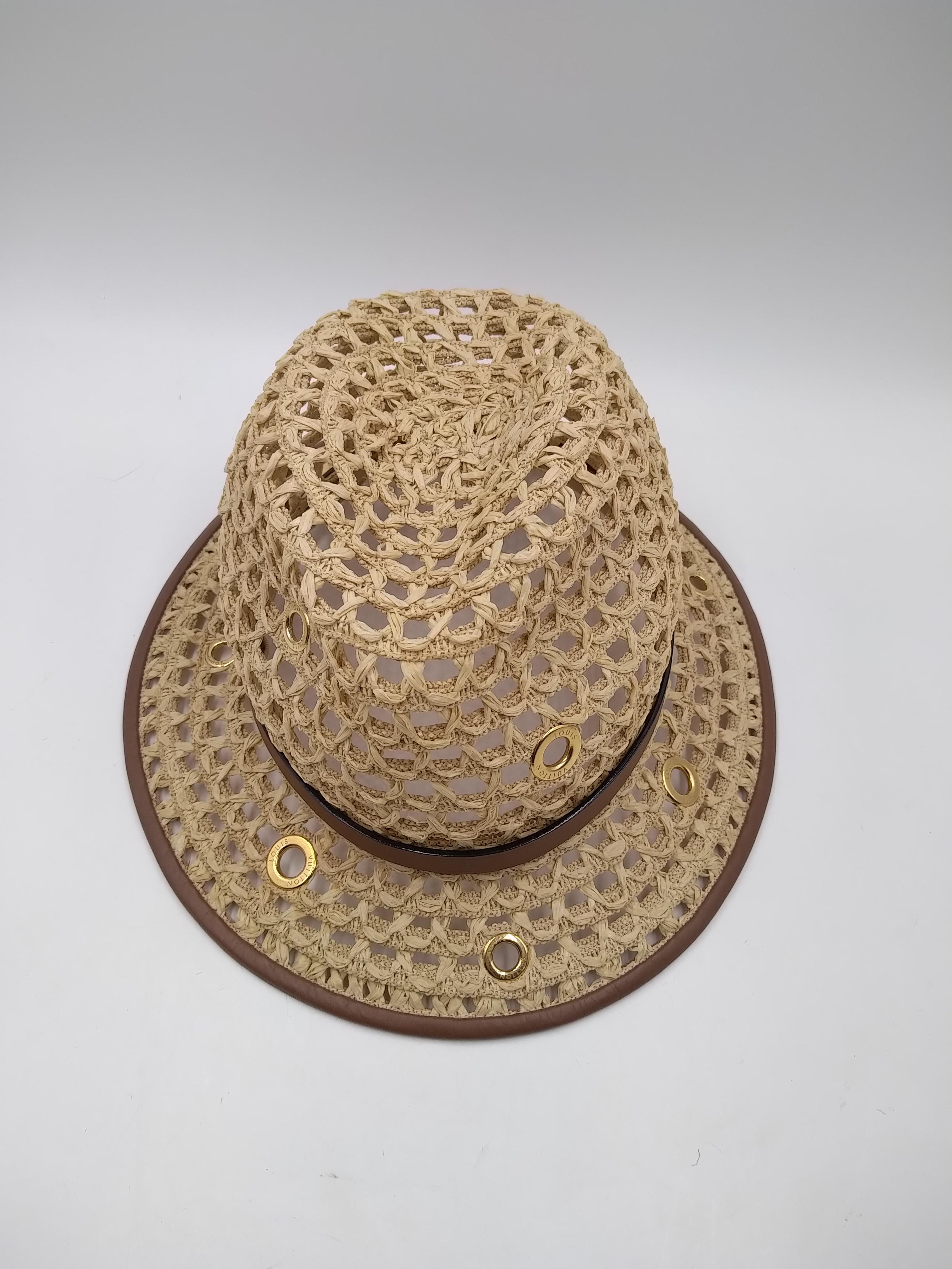 Louis Vuitton Straw Panama Cruise 2011 Summer Sun Hat
-100% authentic Louis Vuitton
- Viscose with leather trim and grommets to body and rim
- Circumference 56 cm