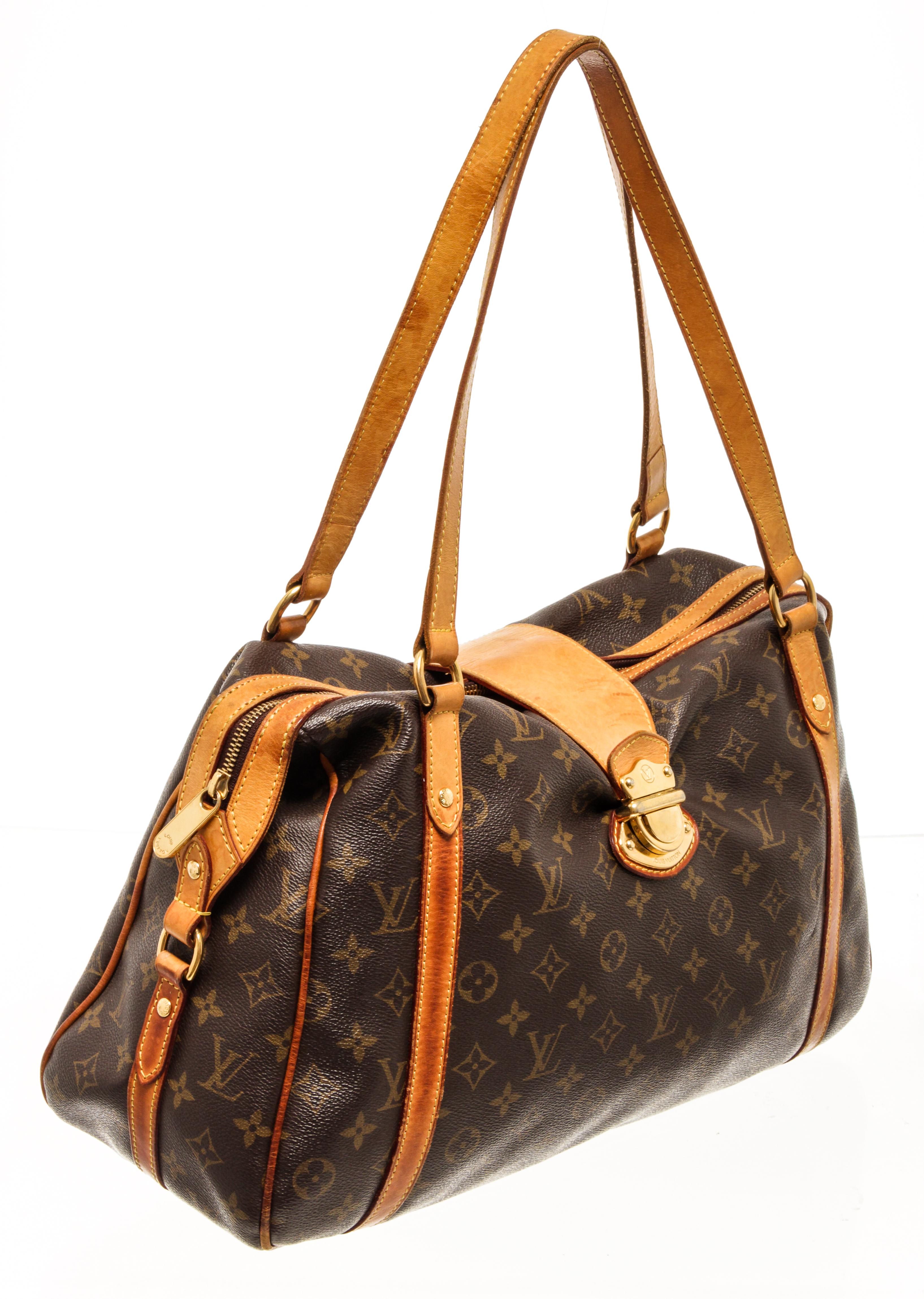 Louis Vuitton Stresa MM with vachetta top handle, zipper closure, gold-toned hardware, and brown fabric lining.

80529MSC