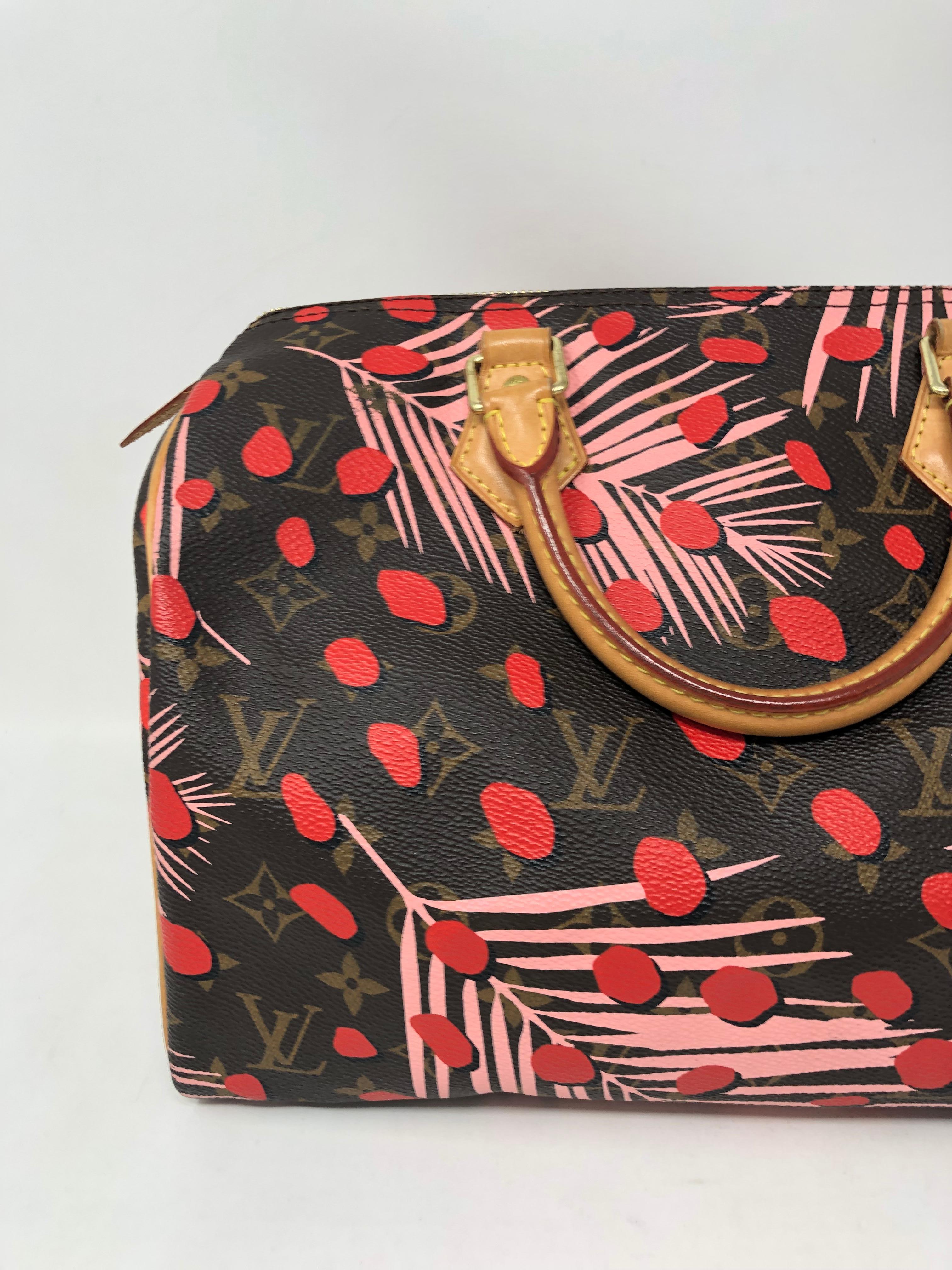 Louis Vuitton limited edition Sugar Pink Poppy Jungle Speedy 30 in monogram. Rare collector's piece in good condition. Vibrant jungle print layered with the classic monogram canvas. From 2016. Guaranteed authentic. 