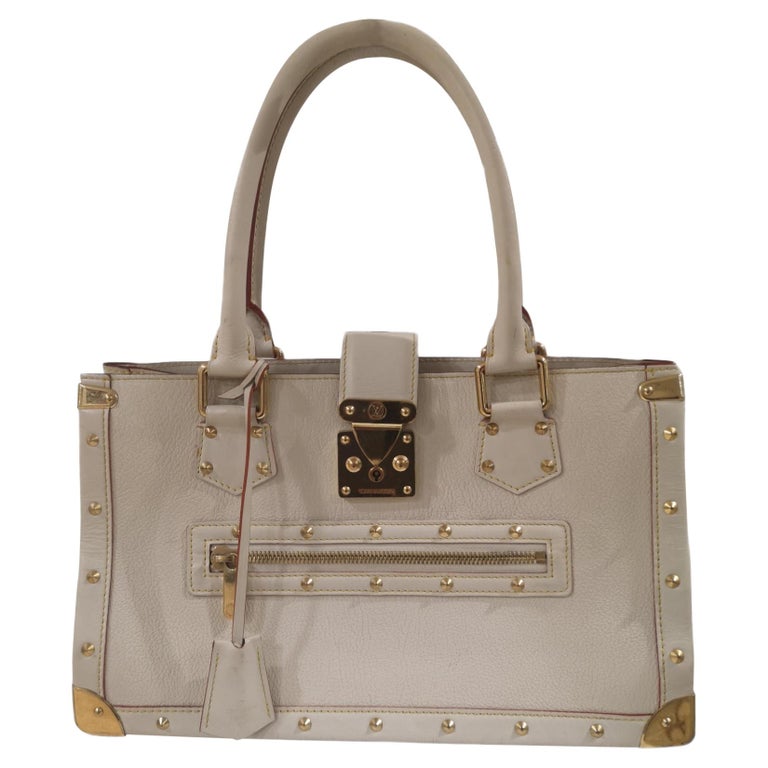 LOUIS VUITTON Cream Sheared Mink Handbag With Leather Handles at