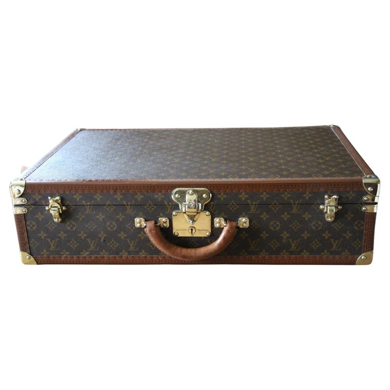 Vintage Louis Vuitton Luggage Black Epi Leather Four-Piece Set, Brass  Detailing at 1stDibs