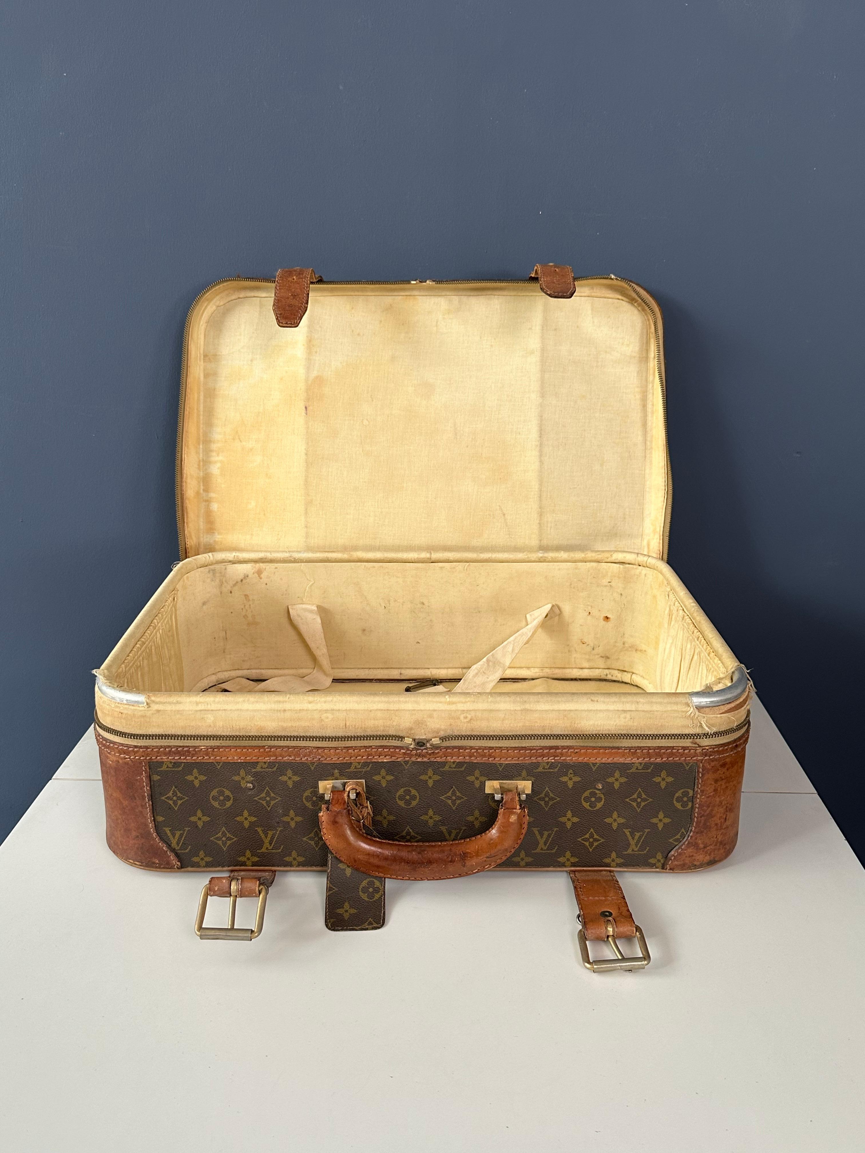 Travel in style with this iconic Louis Vuitton suitcase. Crafted from premium materials and featuring the signature monogram, it’s the epitome of luxury and timeless elegance.