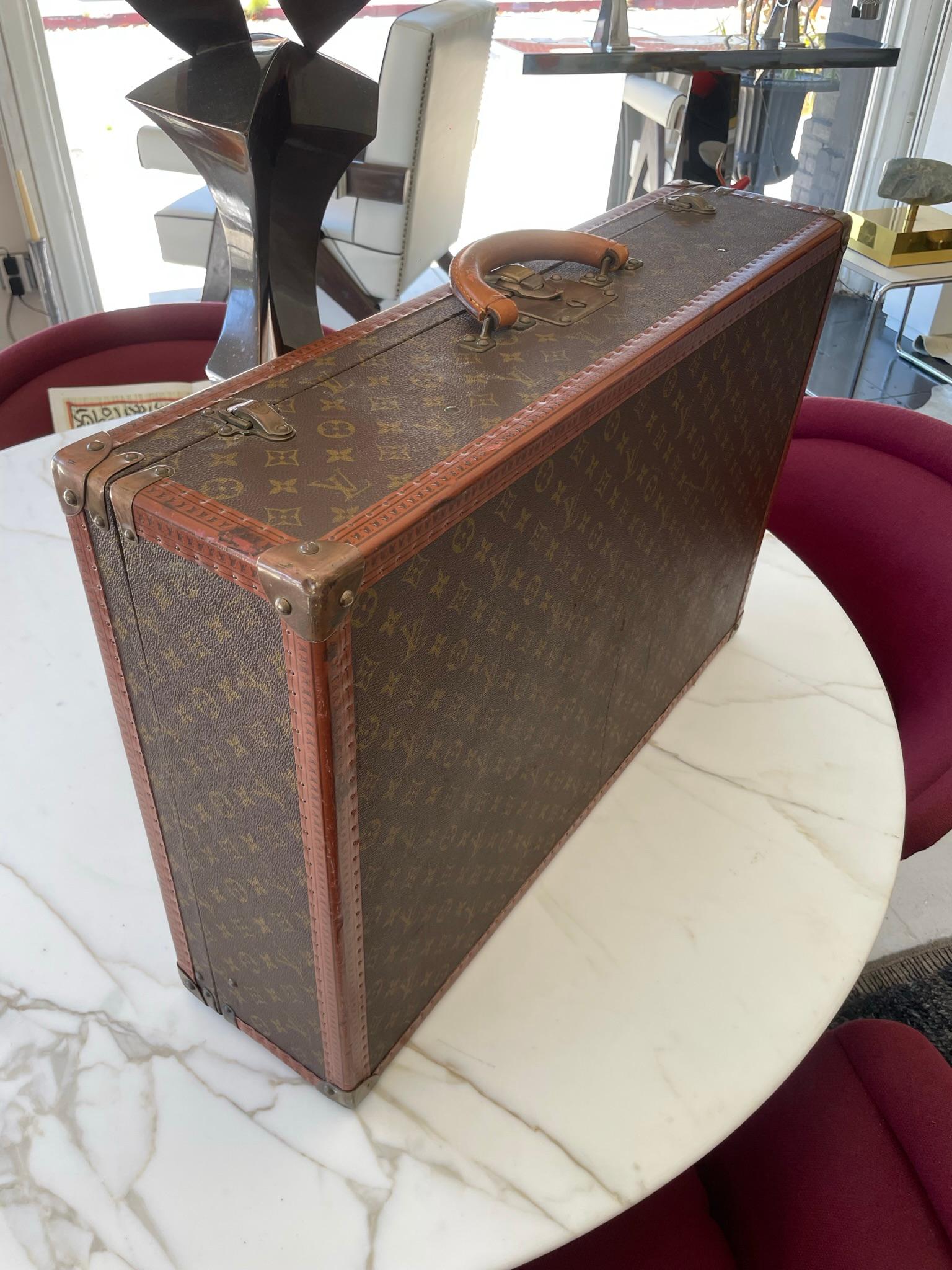 Louis Vuitton Suitcase in great vintage condition. France, 1940s.
 