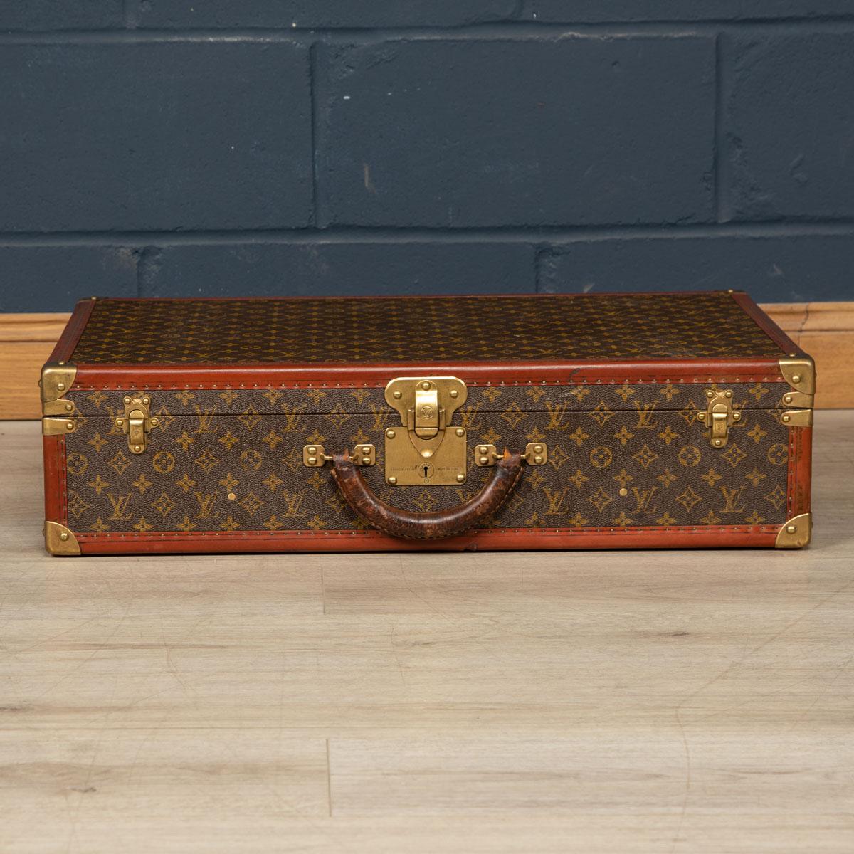 A charming Louis Vuitton hard-sided case, mid to late 20th century, the exterior finished in the famous monogram canvas with brass fittings. A great piece for use today or as a decorative item for the home.

Condition
In Good Condition - Some