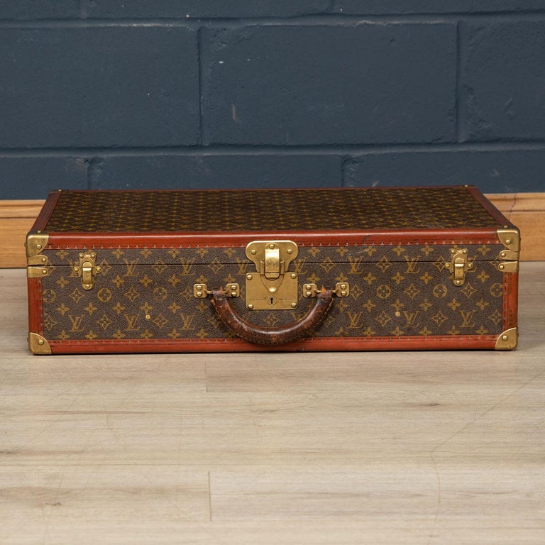 A charming Louis Vuitton hard-sided case, mid to late 20th century, the exterior finished in the famous monogram canvas with brass fittings. A great piece for use today or as a decorative item for the home.

Condition
In Good Condition - Some