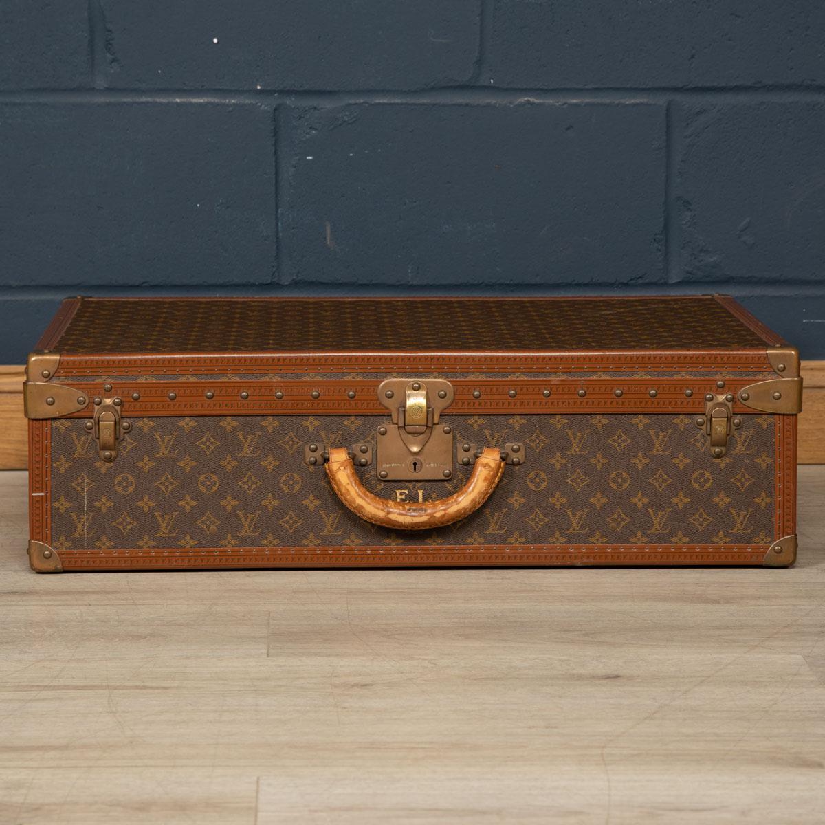 A charming Louis Vuitton hard-sided case, mid to late 20th century, the exterior finished in the famous monogram canvas with brass fittings. A great piece for use today or as a decorative item for the home.

CONDITION
In good condition - some