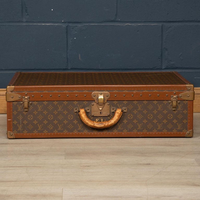 A charming Louis Vuitton hard-sided case, mid to late 20th century, the exterior finished in the famous monogram canvas with brass fittings. A great piece for use today or as a decorative item for the home.

CONDITION
In good condition - some