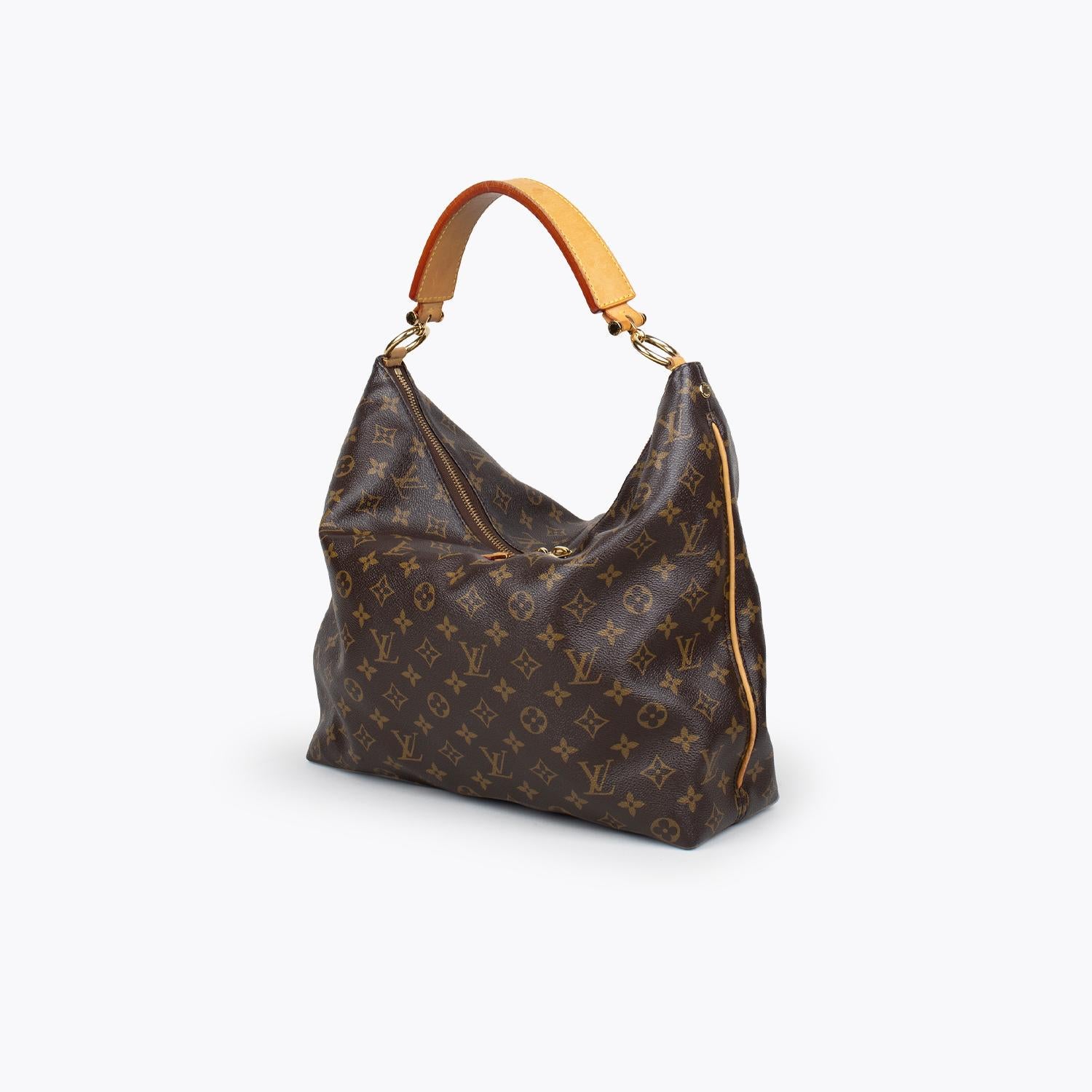 Brown monogram coated canvas Louis Vuitton Sully MM with

– Brass hardware
– Single flat top handle
– Tan Vachetta leather trim
– Brown canvas lining, three slit pockets at interior walls and two-way zip closures at top

Overall Preloved Condition: