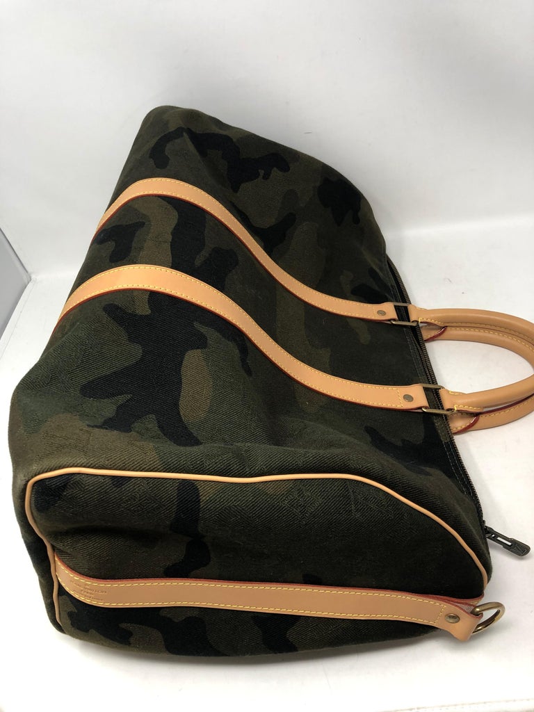 Louis Vuitton x Supreme Monogram Camouflage Keepall Bandouliere 45 Bag at  1stDibs  camo louis vuitton duffle bag, louis vuitton camo keepall, camo louis  vuitton bag