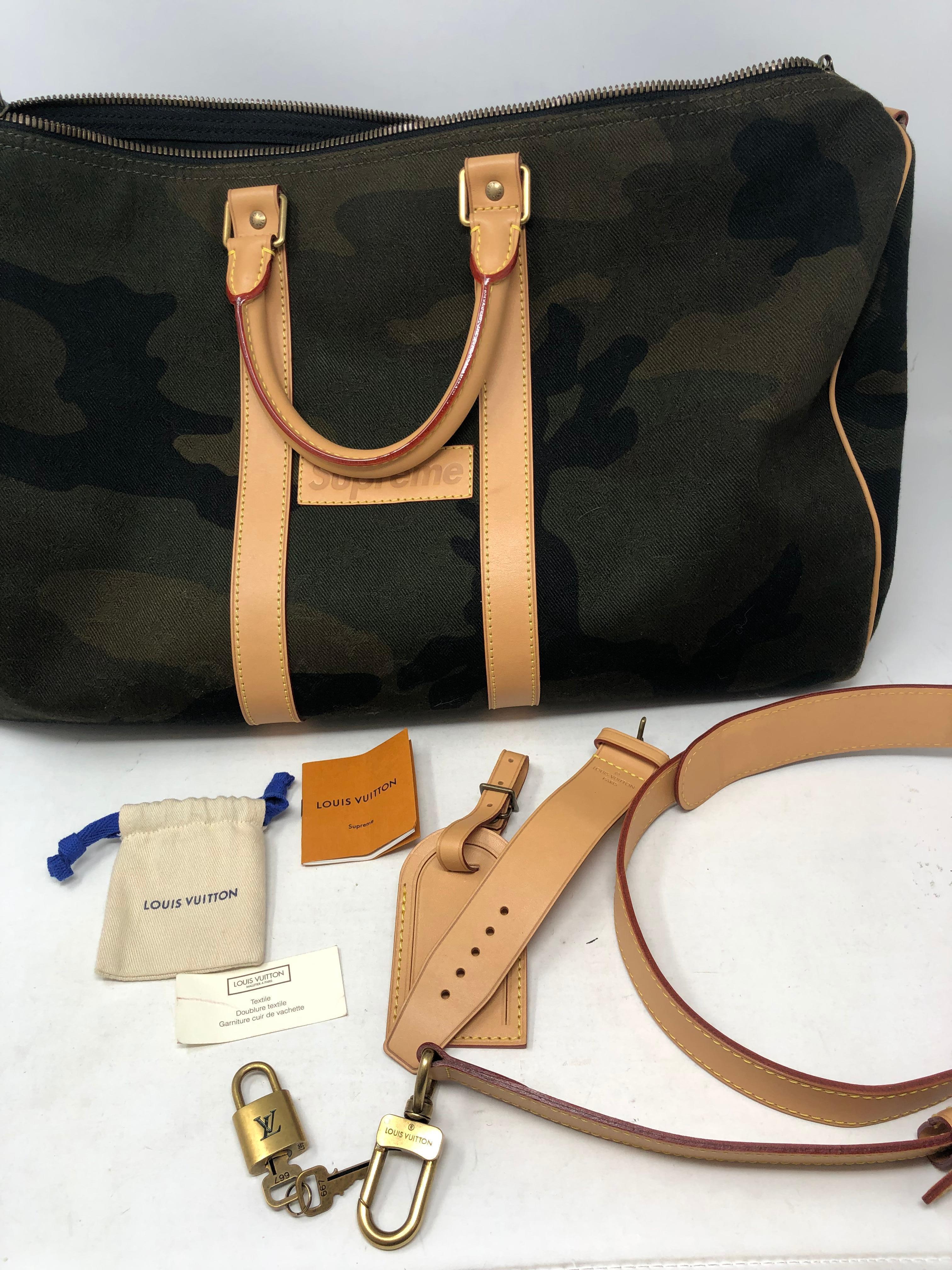 Louis Vuitton Supreme Camouflage Keepall 45. Brand New Condition. Limited Supreme Collection. Includes lock, keys, strap, luggage holder, pamphlet, and dust cover. Guaranteed authentic. 