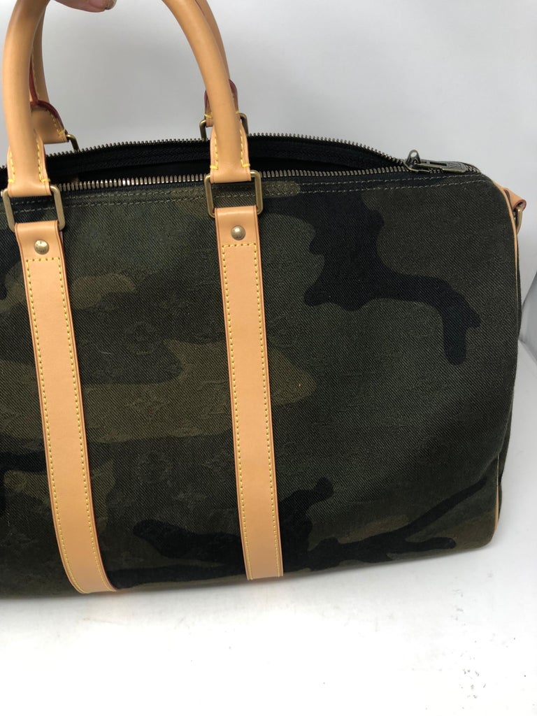 Louis Vuitton x Supreme Monogram Camouflage Keepall Bandouliere 45 Bag at  1stDibs  camo louis vuitton duffle bag, louis vuitton camo keepall, camo  louis vuitton bag