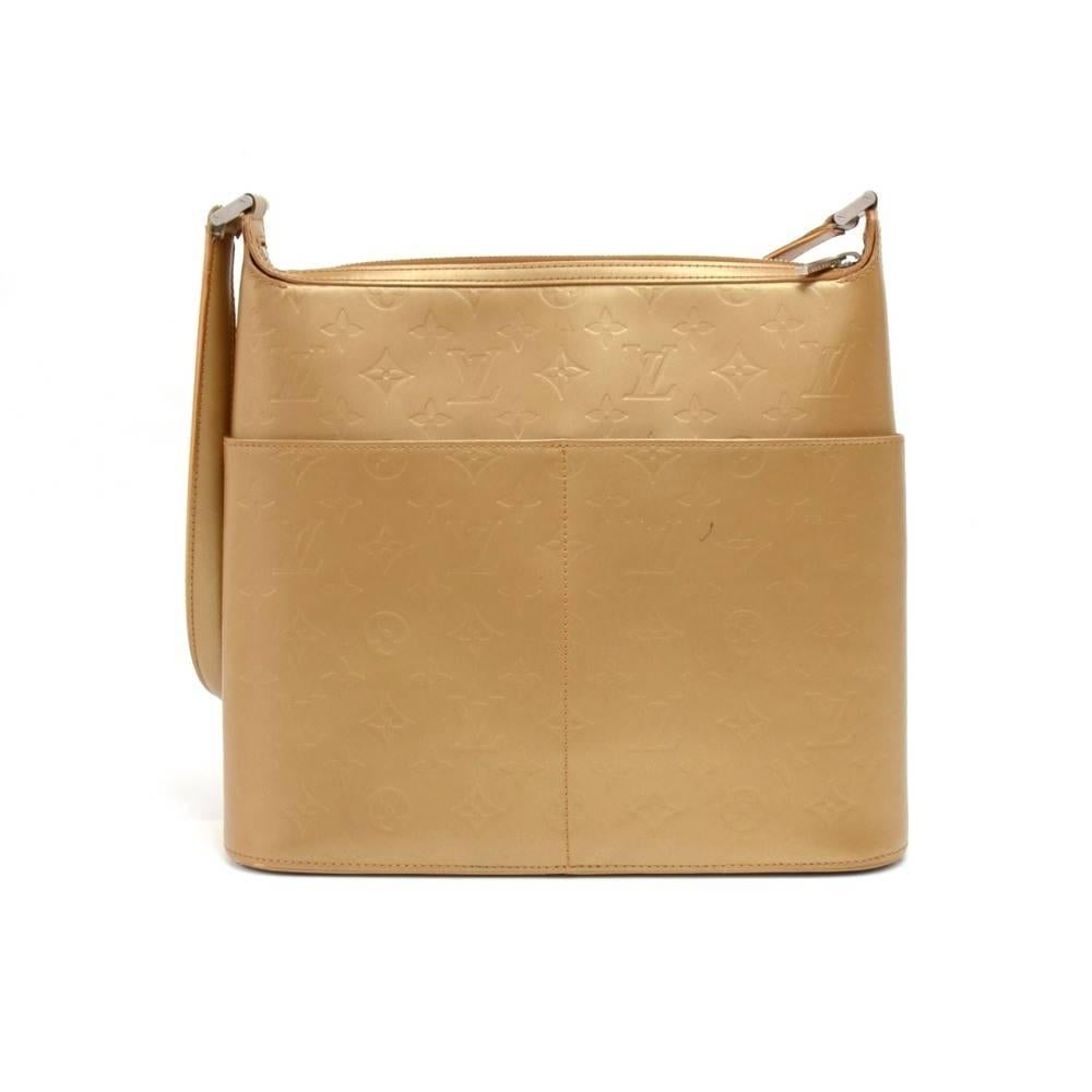 Louis Vuitton Sutter Shoulder bag in Gold Monogram matt leather. Has lovely silver tone hardware. Outside has 2 slip pockets on both sides of the bag and main access is secured with a zipper. Inside has gold fabric lining and has one slip pocket and