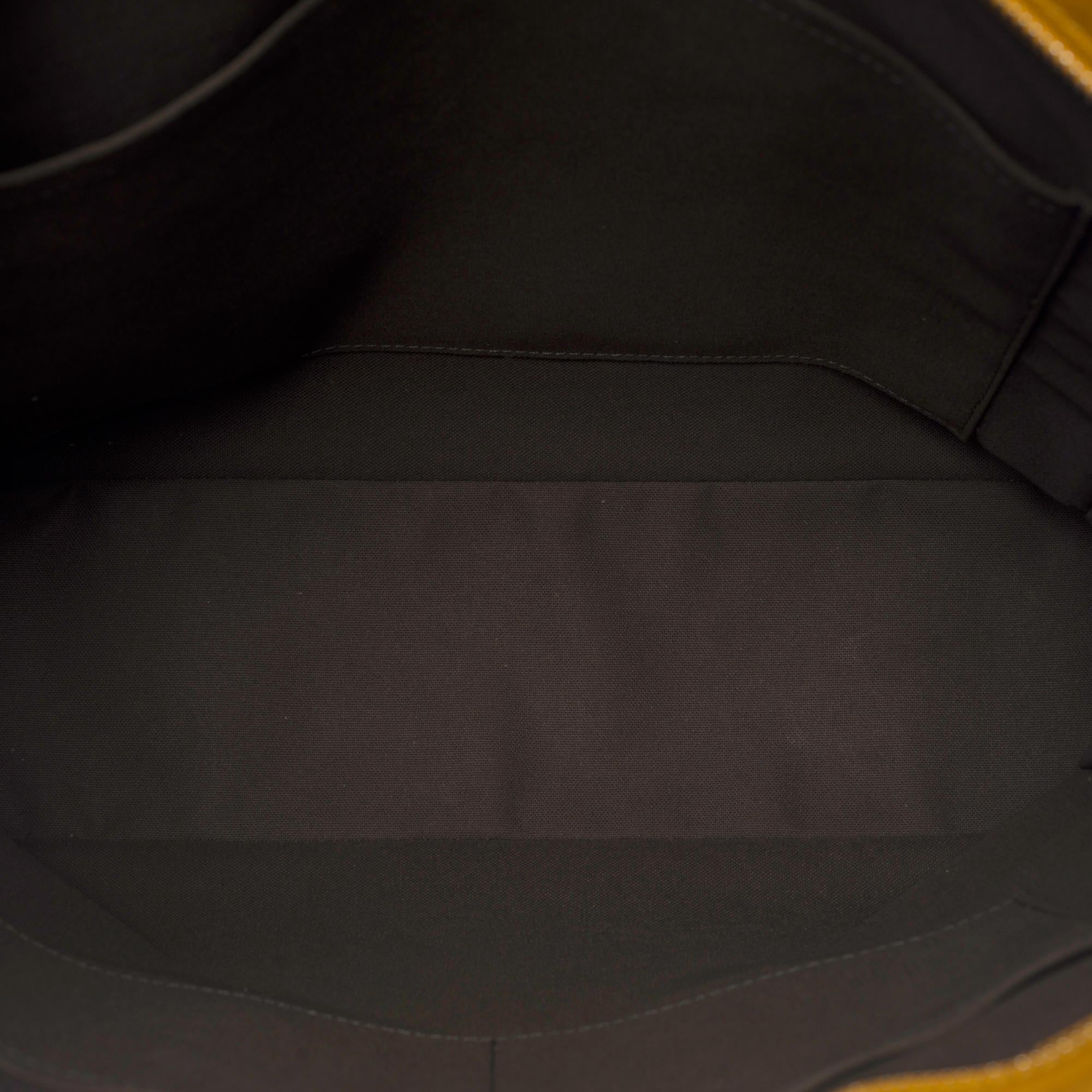 Louis Vuitton Tadao Shoulder bag in Yellow empreinte leather, black silver metal In Good Condition In Paris, IDF