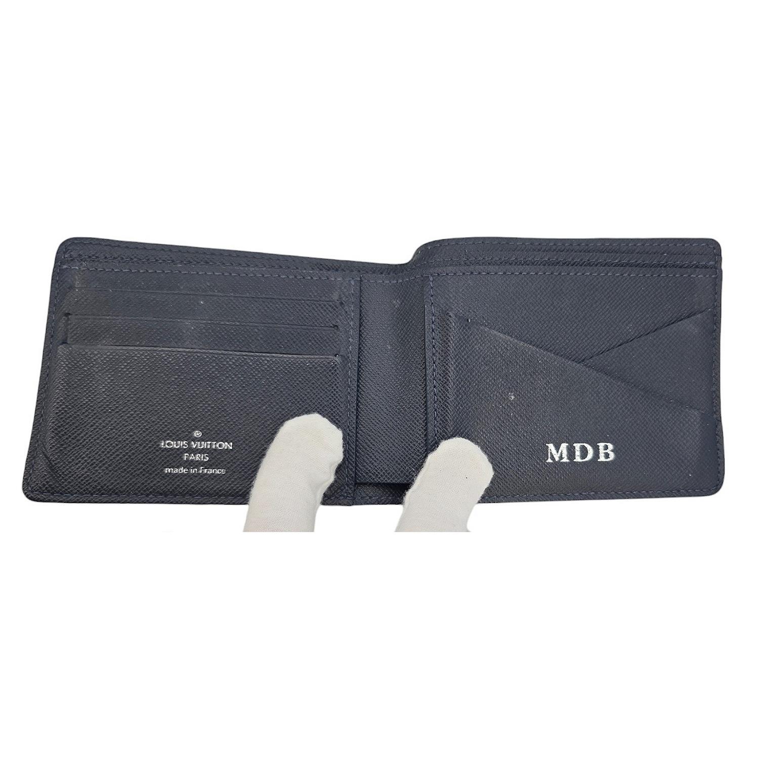 Louis Vuitton - Portefeuille Taiga bifold multiple en vente 1