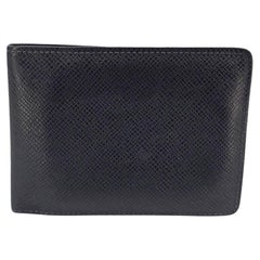 Portafoglio multiplo Louis Vuitton Taiga Bifold