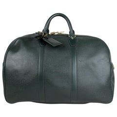 Louis Vuitton Taïga Kendall PM Bag