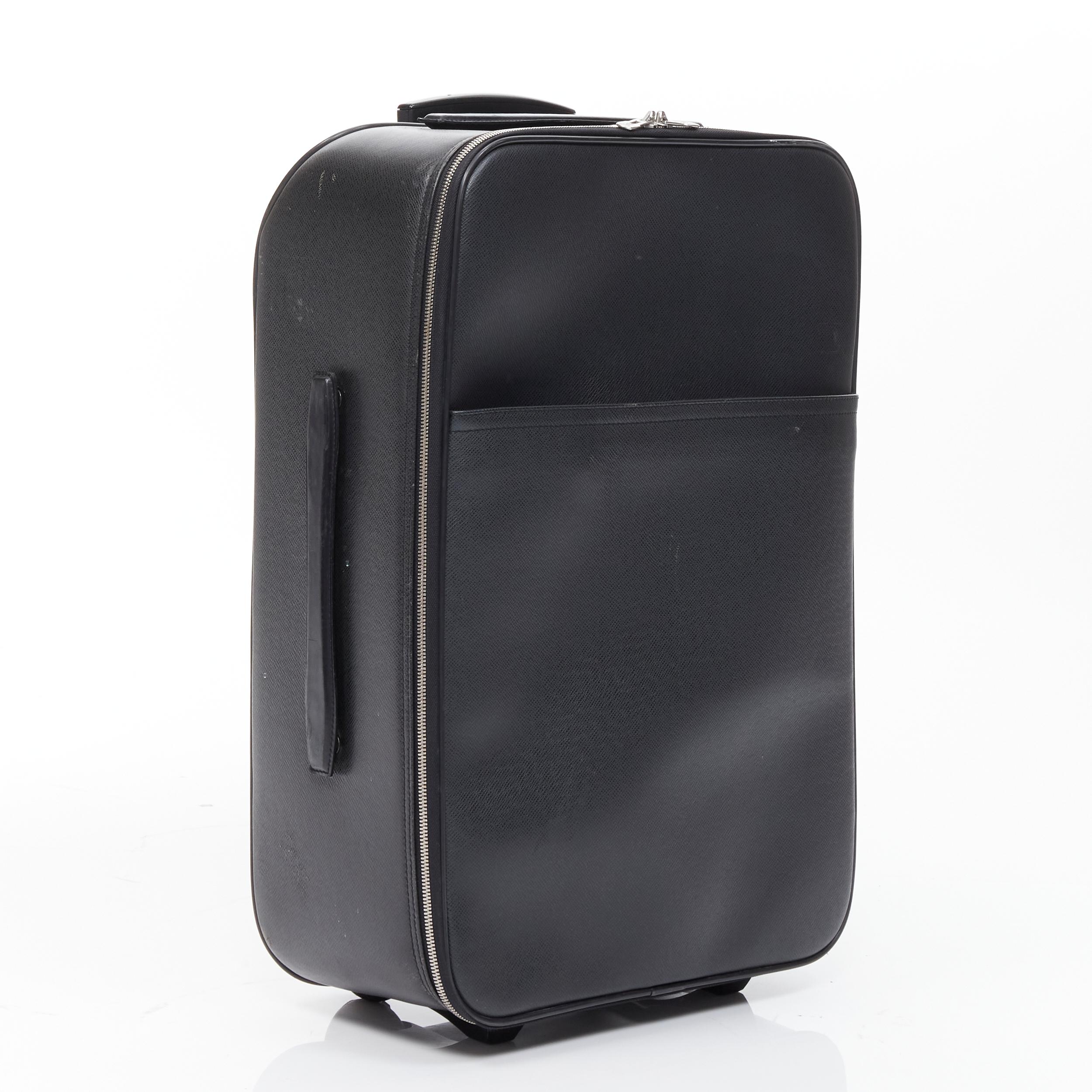 LOUIS VUITTON Taiga Pegase 60 Business black rolling suitcase luggage 
Reference: GIYG/A00098 
Brand: Louis Vuitton 
Model: Pegase Taiga 
Material: Leather 
Color: Black 
Pattern: Solid 
Closure: Zip 
Extra Detail: The PâˆšÂ©gase 60 by Louis Vuitton