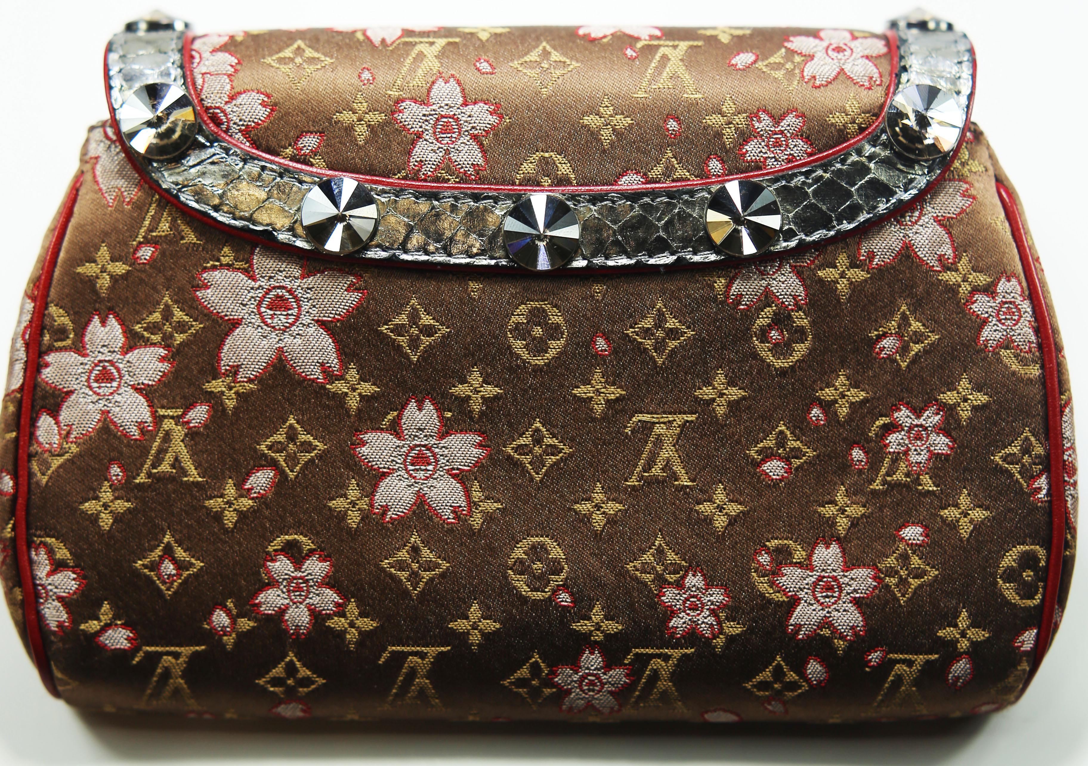 Louis Vuitton Takashi Murakami Monogram Satin Cherry Blossom Evening Purse
Made In: France 
Color: Red Bourdeaux
Materials: Leather
Closure/Opening: Slip-on
Overall Condition: Very good pre-owned condition, restored soles, the hardware and the