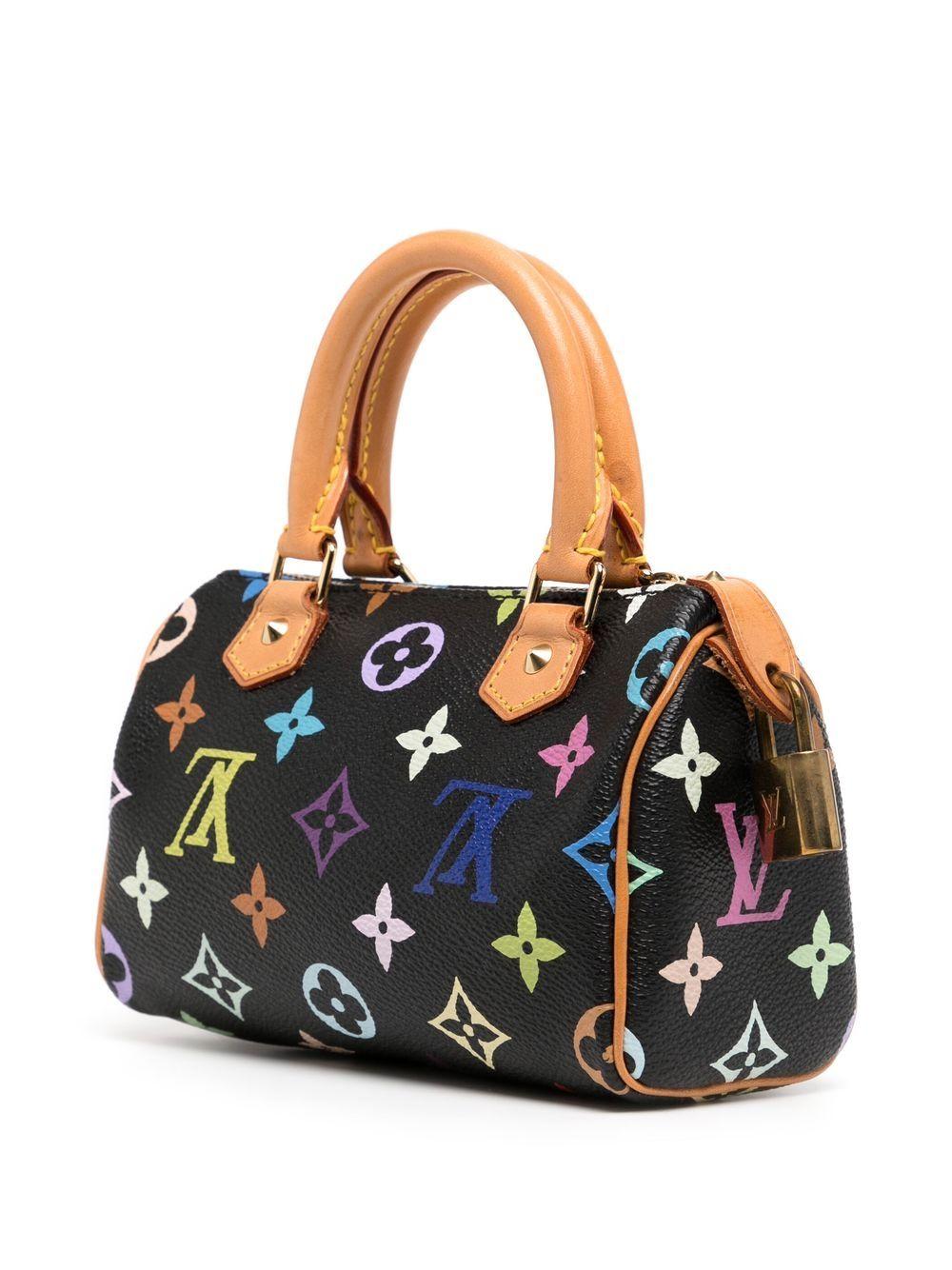 Described by Marc Jacobs as a “monumental marriage between art and business” the Louis Vuitton x Takashi Murakami mini Speedy handbag boasts a bright palette replacing the brand’s classic brown monogram. Injecting hot pink, turquoise, yellow and