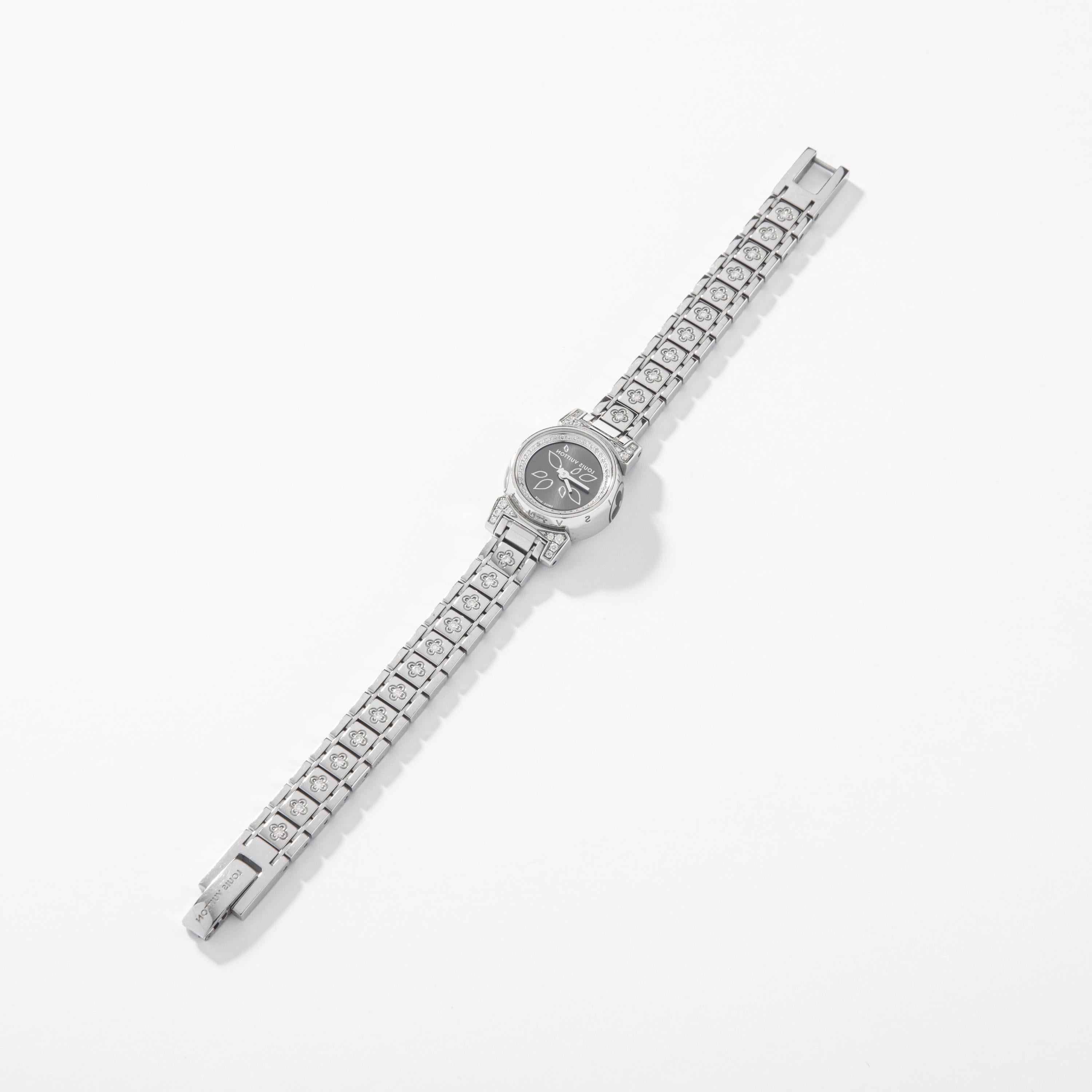 Louis Vuitton Tambour Stainless Steel Diamonds Ladies Watch
Bijou Petale 18mm.

Designer: Louis Vuitton
Origin: Switzerland
Date/Authenticity Code: SA0106-Q151G Louis Vuitton' stamping
Bracelet length: 5.91 inches (15.00 centimeters).
Measurements: