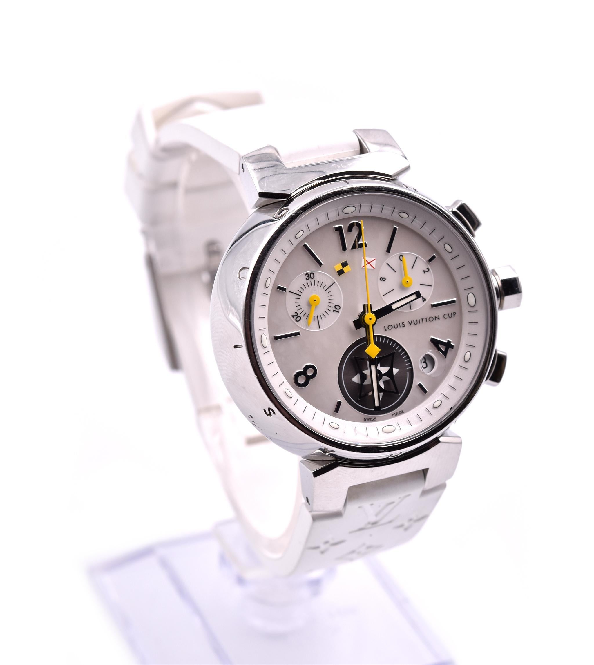 Movement: quartz
Function: hours, minutes, date, chronograph
Case: 34mm round stainless steel case
Dial: white mother of pearl, Arabic numerals, yellow monogram-shaped seconds hand
Band: white rubber strap embossed with Louis Vuitton monogram