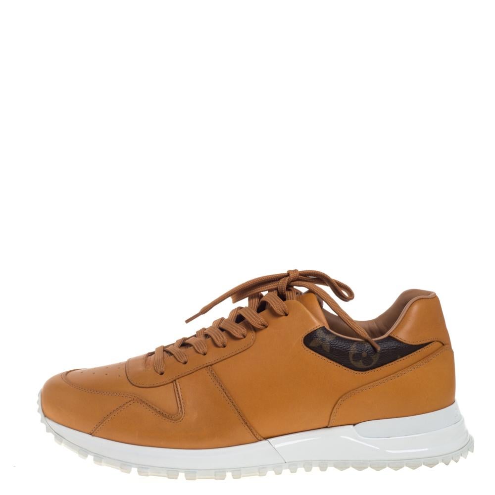Made to provide comfort, these Run Away sneakers by Louis Vuitton are trendy and stylish. They've been crafted from tan leather and the signature monogram canvas and designed with round toes, lace-ups on the vamps, and brand details on the counters.