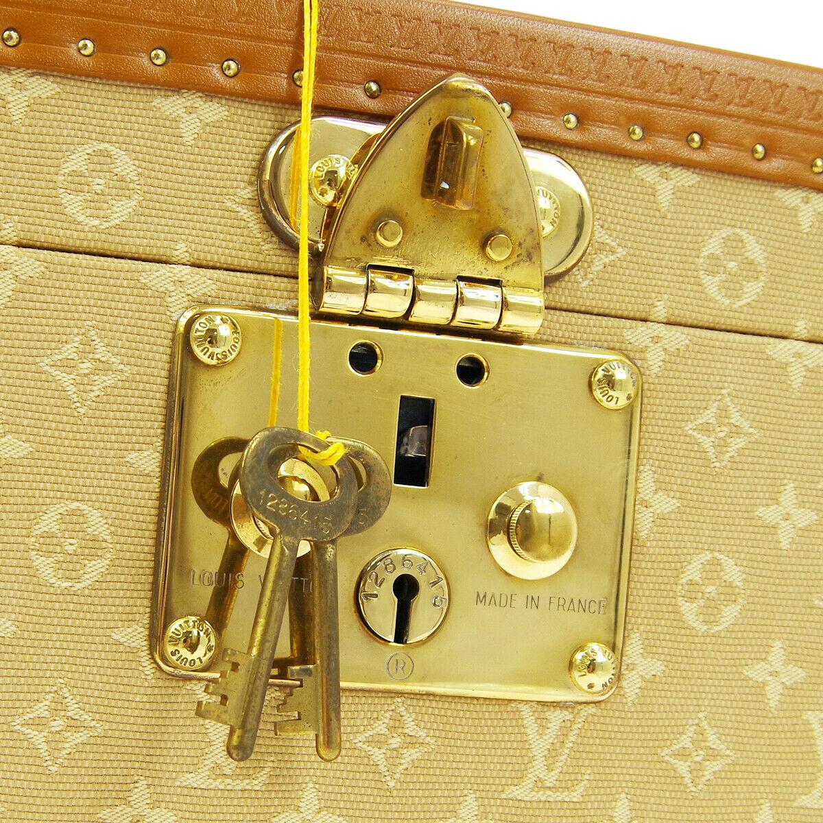 Louis Vuitton Limited Edition Tan Monogram Leather Travel Vanity Top Handle Storage Box Trunk

Fabric
Leather
Silver tone hardware
Flip lock closure
Velvet lining
Date code present
Made in France
Handle drop 1.5