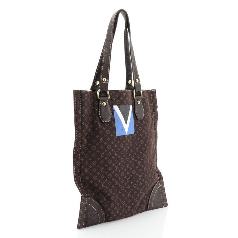 This Louis Vuitton Tanger Sac Plat Mini Lin, crafted in brown mini lin canvas, features dual leather handles, printed Regatta logo, and gold-tone hardware. It opens to a brown fabric interior with zip pocket. Authenticity code reads: TH0045.