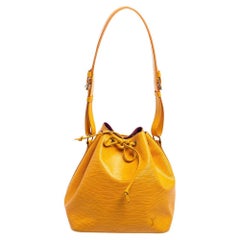 Louis Vuitton - Sac à bandoulière Petit Noe en cuir épi jaune à pampilles
