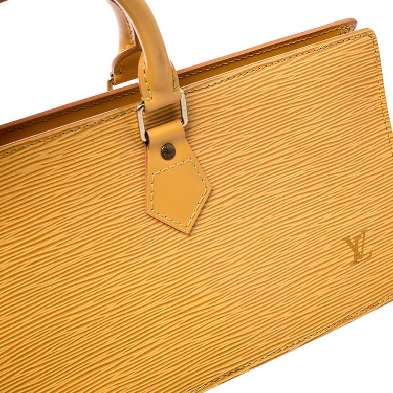 Louis Vuitton Tassil Yellow Epi Leather Sac Triangle Bag For Sale at  1stDibs  louis vuitton epi sac triangle, louis vuitton sac triangle bag,  lv yellow bag