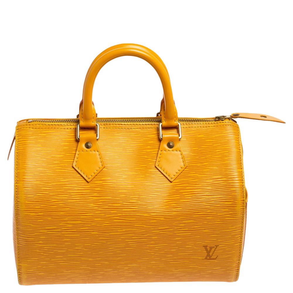 Titled as one of the greatest handbags in the history of luxury fashion, the Speedy from Louis Vuitton was first created for everyday use as a smaller version of their famous Keepall bag. This Speedy 25 comes crafted from Epi leather with two