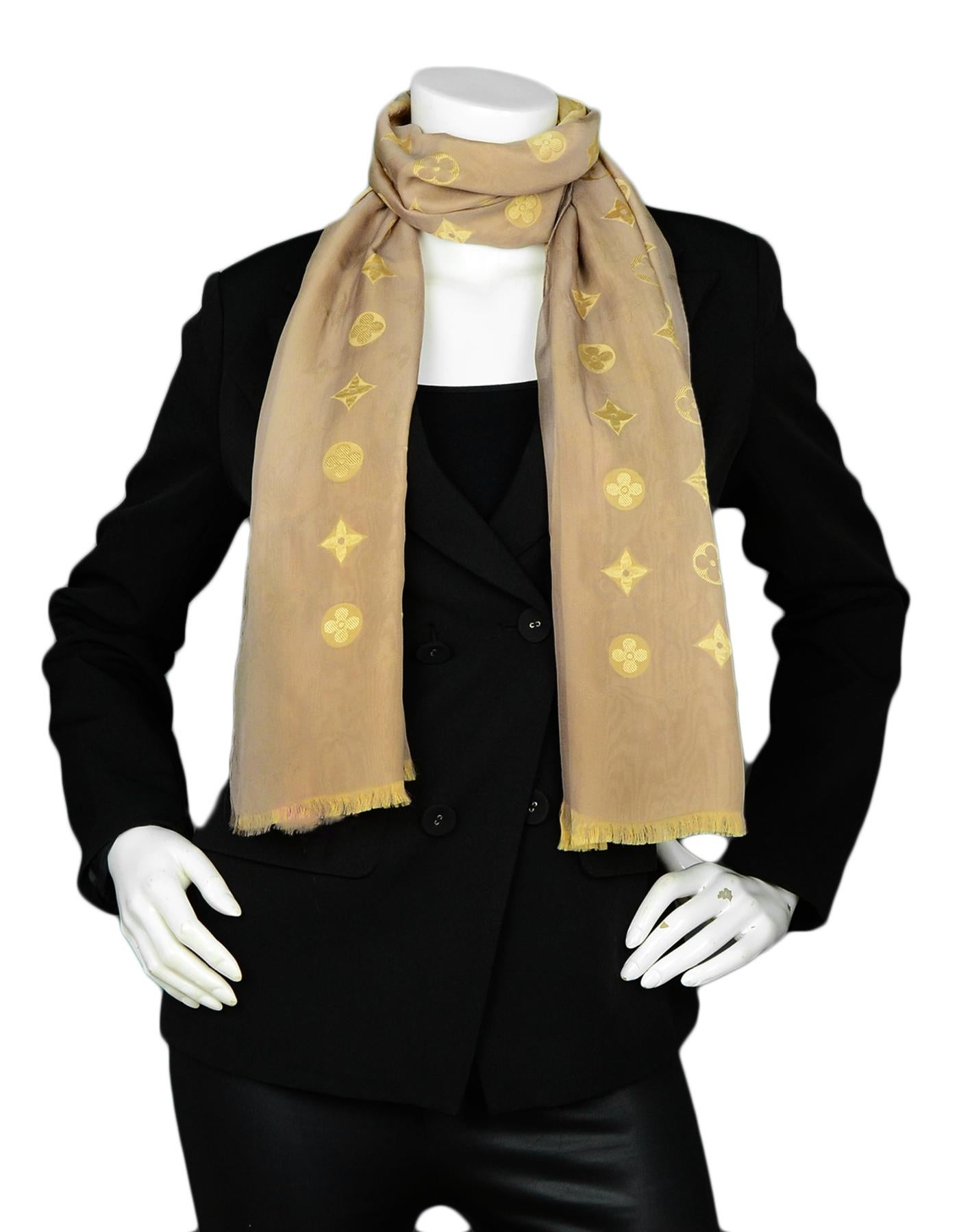 Louis Vuitton Taupe/Beige Reversible Chiffon Monogram Scarf / Stole

Made in: Italy
Color: Taupe, beige
Materials: Acetate, silk
Overall Condition: Very good pre-owned condition, with the exception of some minor stains
Estimated Retail: $450 +