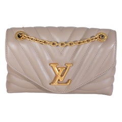 Louis Vuitton in pelle di vitello Taupe &New Chain MM