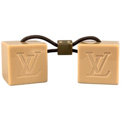 LOUIS VUITTON Taupe Monogram Engraved Cubes Hair Tie at 1stDibs