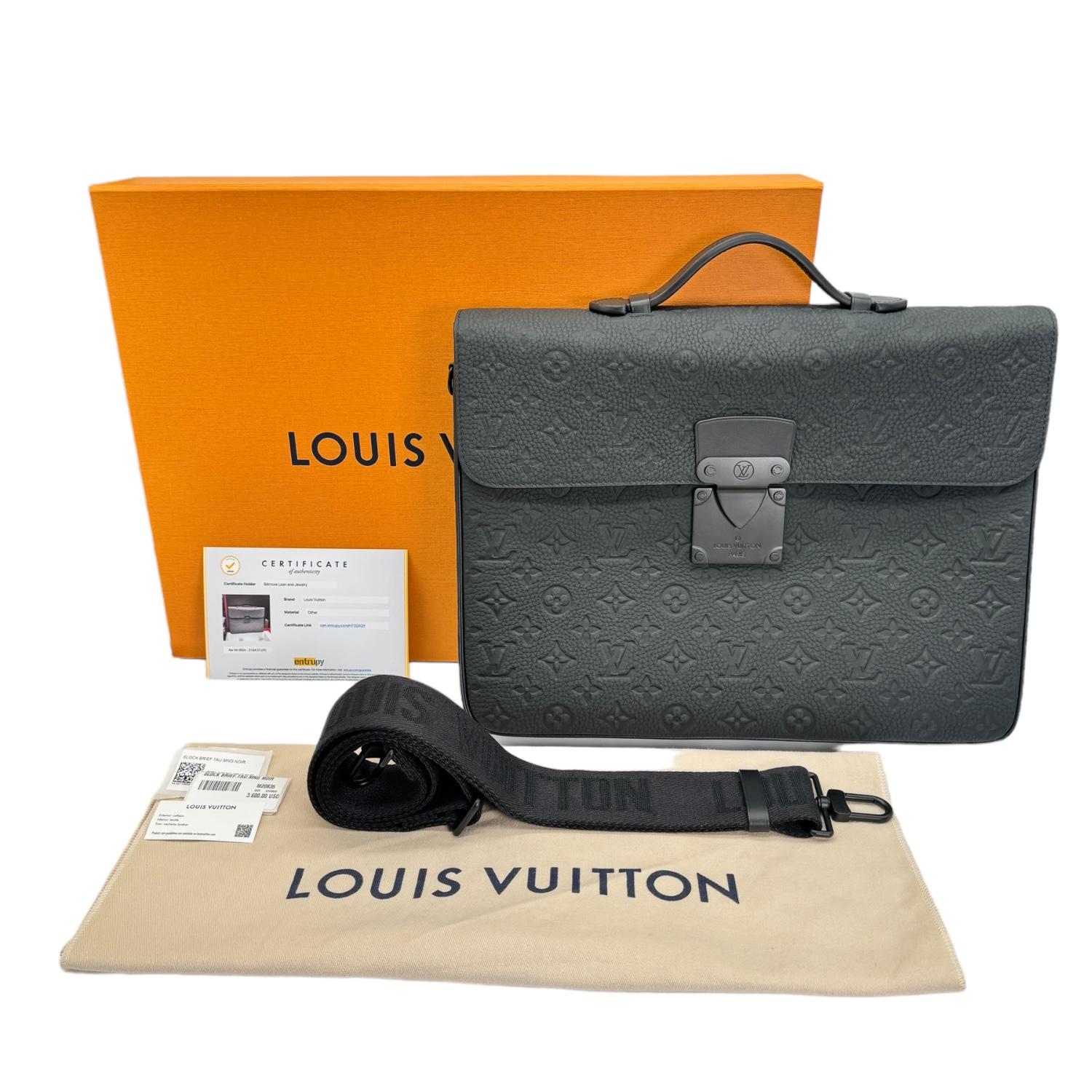 This Louis Vuitton Taurillion S-Lock Monogram Briefcase is crafted in Italy from exquisite Taurillion Monogram Embossed Cowhide Leather, its sleek black exterior highlights the subtle tone-on-tone hardware. The flap closure is secured with a
