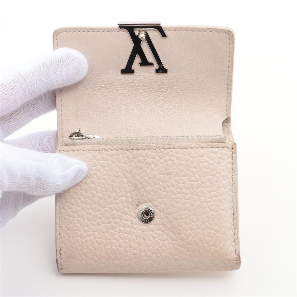 Women's Louis Vuitton Taurillon Portefeuille Capucines Yellow x Beige Wallet For Sale