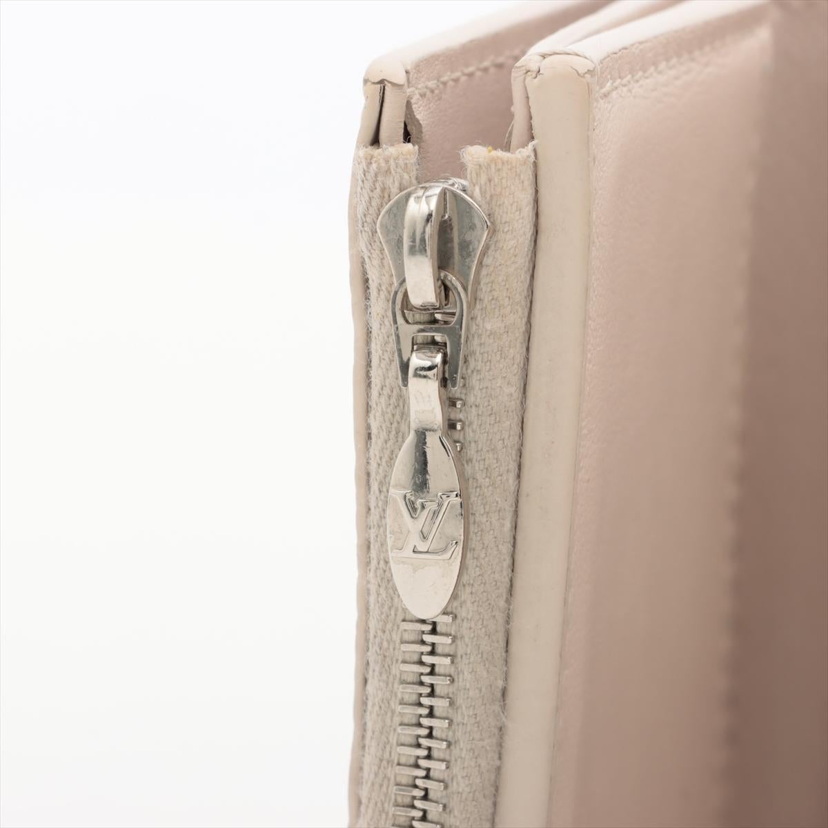Louis Vuitton Taurillon Portefeuille Capucines Yellow x Beige Wallet For Sale 5