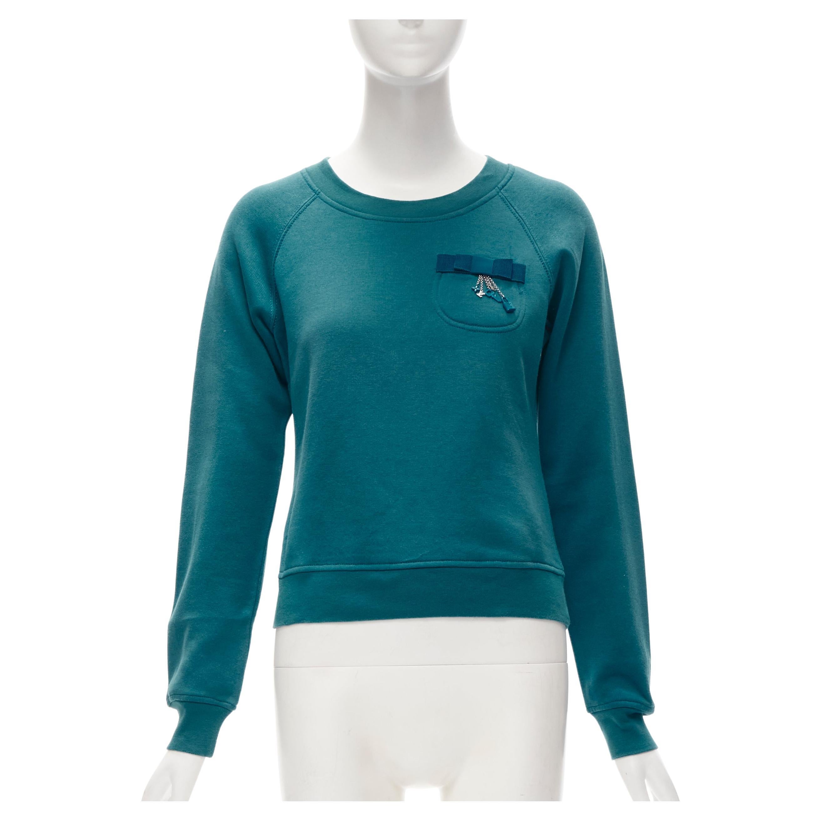 LOUIS VUITTON teal blue bow lock charm patch pocket cotton fleece sweater S For Sale
