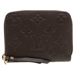 Louis Vuitton Terre Monogram Empreinte Leather Zippy Wallet